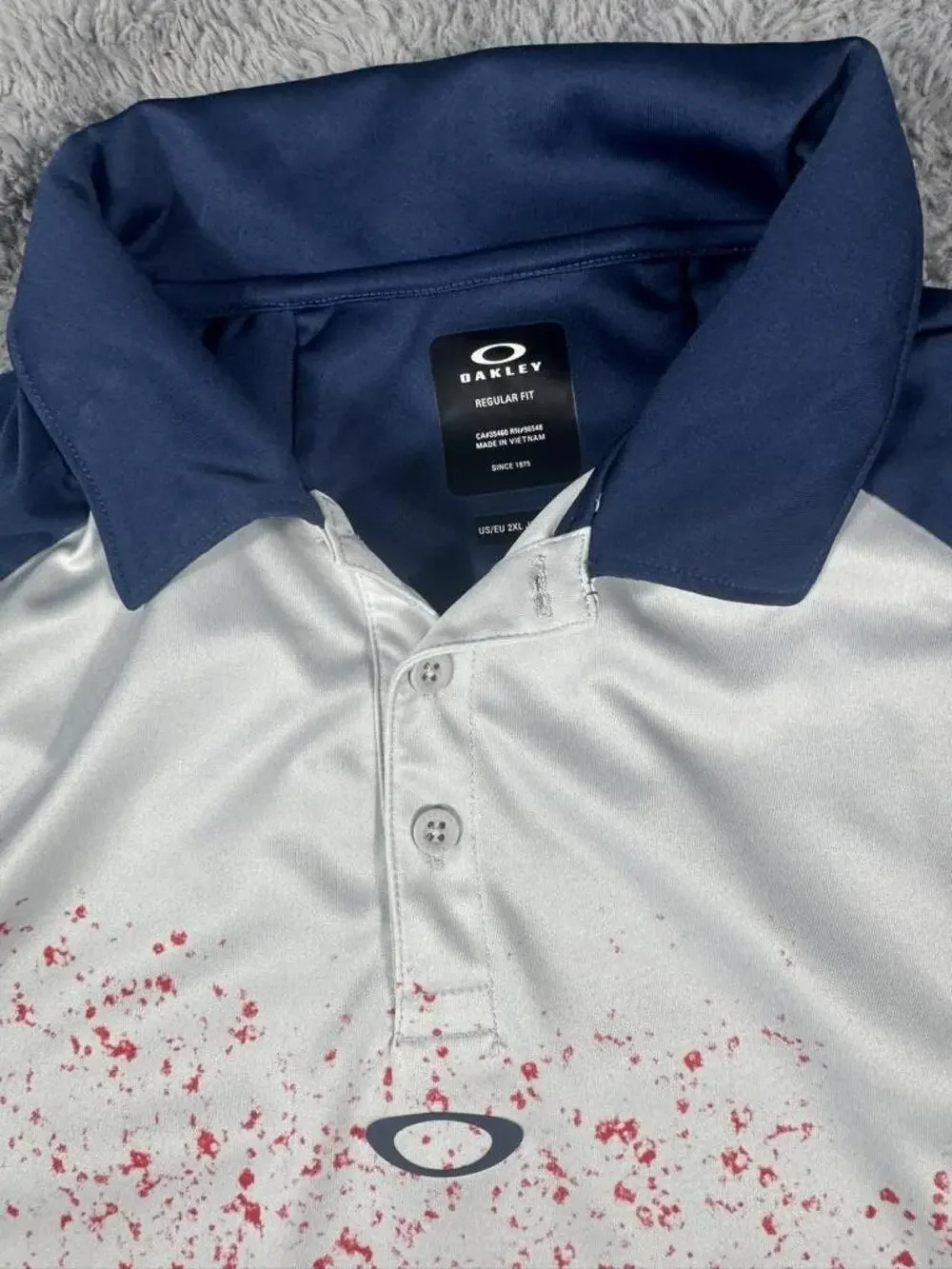 Oakley Golf Polo Shirt Mens 2XL Blue Red Splatter Print Short Sleeve Performance
